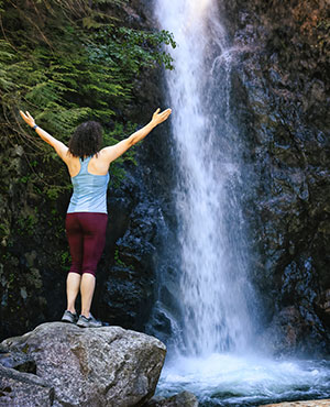 woman at waterfall